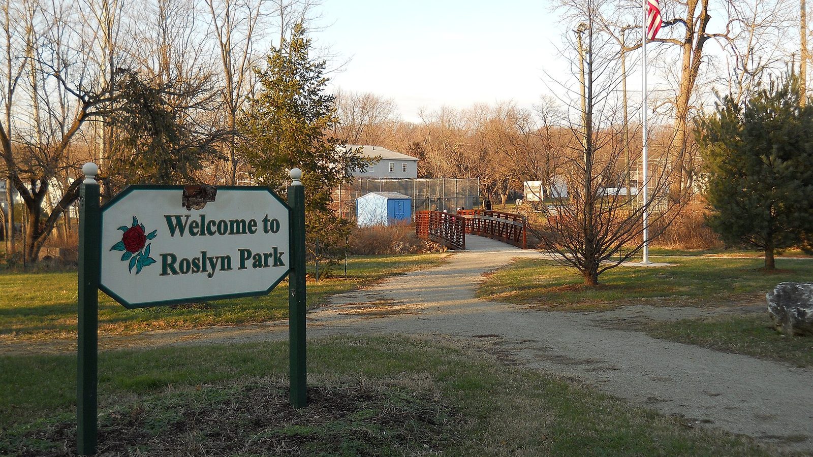 The welcome sign and entrance path at Roslyn Park in the Roslyn section of Abington, Pennsylvania